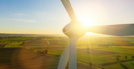 Wind turbines and agricultural fields on a summer day - Energy Production with clean and Renewable Energy - aerial shot- Stock Photo or Stock Video of rcfotostock | RC-Photo-Stock