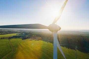 Wind turbines and agricultural fields on a summer day - Energy Production with clean and Renewable Energy - aerial shot- Stock Photo or Stock Video of rcfotostock | RC-Photo-Stock
