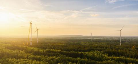 Wind turbines under construction at sunset - Energy Production with clean and Renewable Energy - aerial shot- Stock Photo or Stock Video of rcfotostock | RC-Photo-Stock