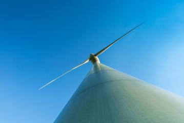 windmill Pinwheel wind turbine wind farm forwards blue skies : Stock Photo or Stock Video Download rcfotostock photos, images and assets rcfotostock | RC Photo Stock.: