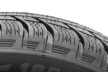 Winter Car tires close-up wheel profile structure on white background- Stock Photo or Stock Video of rcfotostock | RC-Photo-Stock