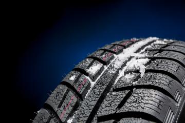 Winter Car tires with snow close-up wheel profile structure on black blue background : Stock Photo or Stock Video Download rcfotostock photos, images and assets rcfotostock | RC Photo Stock.: