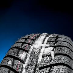 Winter Car tires with snow close-up wheel profile structure on black blue background- Stock Photo or Stock Video of rcfotostock | RC-Photo-Stock