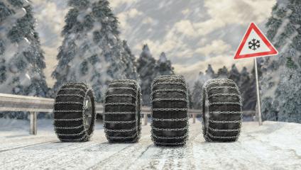 winter tires change - Beware winter is coming, Car tires with snow change on the ice road with road sign- Stock Photo or Stock Video of rcfotostock | RC Photo Stock