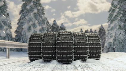 Winter tires with snow chains on a snowy roadway with crash barrier- Stock Photo or Stock Video of rcfotostock | RC Photo Stock