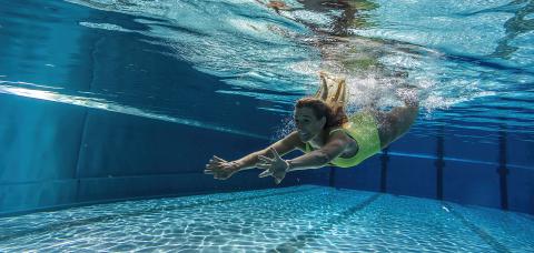 Woman dives underwater in the swimming pool- Stock Photo or Stock Video of rcfotostock | RC Photo Stock