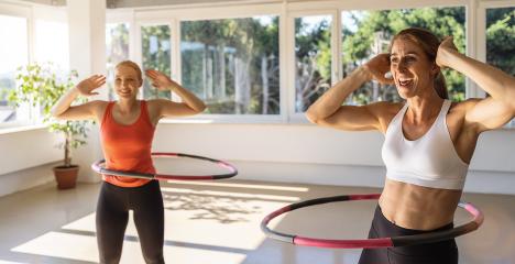 Woman doing hula hoop during an exercise class in a gym. Healthy sports lifestyle, Fitness, Healthy concept. : Stock Photo or Stock Video Download rcfotostock photos, images and assets rcfotostock | RC Photo Stock.:
