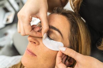 Woman gets prepared for long Eyelashes at cosmetology salon. Las : Stock Photo or Stock Video Download rcfotostock photos, images and assets rcfotostock | RC Photo Stock.: