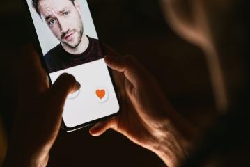 Woman giving a like to photo on social media or swiping on online dating app. Finger pushing heart icon on screen in smartphone application. Friend, follower or fan liking picture of a beautiful man. - Stock Photo or Stock Video of rcfotostock | RC-Photo-Stock
