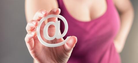 woman holding email sign (at sign)- Stock Photo or Stock Video of rcfotostock | RC Photo Stock