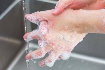 Woman in a bathrobe is washing hands- Stock Photo or Stock Video of rcfotostock | RC Photo Stock