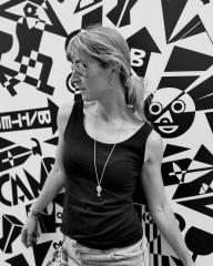 Woman in black tank top and sunglasses, with necklace, leaning against a wall with abstract black and white graffiti, looking to the side, urban, stylish, artistic
 : Stock Photo or Stock Video Download rcfotostock photos, images and assets rcfotostock | RC Photo Stock.: