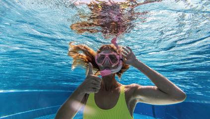 woman in snorkeling mask dive underwater in swimming pool with thumbs up. Travel lifestyle, water sport outdoor adventure, swimming lessons on summer holidays.- Stock Photo or Stock Video of rcfotostock | RC Photo Stock