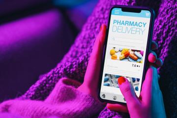 Woman lies on sofa holding mobile phone with internet pharmacy shopping app. Pharmacy shop Mokup. Medical, help, support online. Health care telemedicine application on smartphone screen application.- Stock Photo or Stock Video of rcfotostock | RC Photo Stock