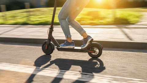 woman riding black electric kick scooter at cityscape at summer, motion blur : Stock Photo or Stock Video Download rcfotostock photos, images and assets rcfotostock | RC Photo Stock.: