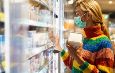 Woman shopping in supermarket during coronavirus lockdown at freezer section  : Stock Photo or Stock Video Download rcfotostock photos, images and assets rcfotostock | RC Photo Stock.: