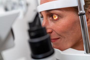 Woman undergoing an eye examination with a focus on her illumina- Stock Photo or Stock Video of rcfotostock | RC Photo Stock