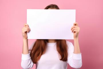 Woman with long brown hair holding a blank white sign- Stock Photo or Stock Video of rcfotostock | RC Photo Stock