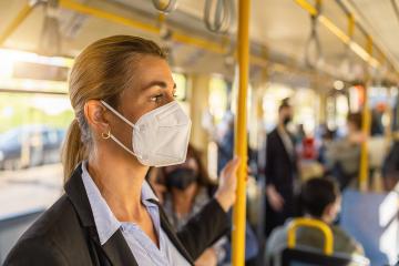 woman with medical FFP3 mask in the subway- Stock Photo or Stock Video of rcfotostock | RC Photo Stock
