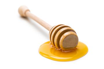 wooden honey dipper with golden honey : Stock Photo or Stock Video Download rcfotostock photos, images and assets rcfotostock | RC-Photo-Stock.: