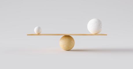 wooden scale balancing one big ball and one small ball. Concept of harmony and balance- Stock Photo or Stock Video of rcfotostock | RC-Photo-Stock