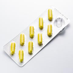 Yellow capsule Tablets pills in a Blister packaging doctor antibiotic pharmacy medicine medical : Stock Photo or Stock Video Download rcfotostock photos, images and assets rcfotostock | RC-Photo-Stock.: