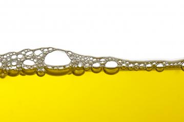 Yellow liquid with bubbles- Stock Photo or Stock Video of rcfotostock | RC-Photo-Stock