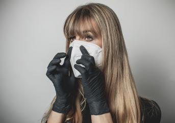 young, blond beautiful woman puts ffp2 protective mask on with protective medical gloves for protection against corona : Stock Photo or Stock Video Download rcfotostock photos, images and assets rcfotostock | RC Photo Stock.: