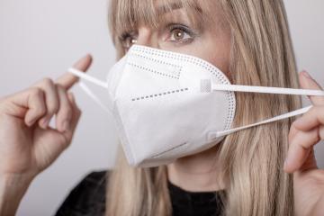 young, blond beautiful woman puts ffp2 protective mask on with protective medical gloves for protection against corona : Stock Photo or Stock Video Download rcfotostock photos, images and assets rcfotostock | RC Photo Stock.: