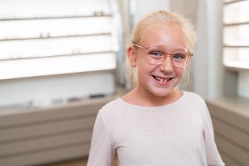 Young girl with glasses smiling in an optical shop
. - Stock Photo or Stock Video of rcfotostock | RC Photo Stock