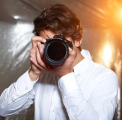 Young handsome photographer : Stock Photo or Stock Video Download rcfotostock photos, images and assets rcfotostock | RC-Photo-Stock.: