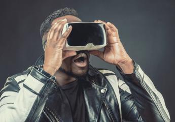 Young man wearing virtual reality googles / VR Glasses- Stock Photo or Stock Video of rcfotostock | RC-Photo-Stock