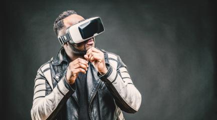 Young man wearing virtual reality googles / VR Glasses- Stock Photo or Stock Video of rcfotostock | RC Photo Stock