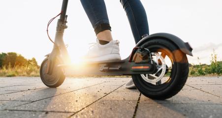 Young woman is ready to discover the urban city at sunset with electric scooter or e-scooter, Electric urban transportation concept image : Stock Photo or Stock Video Download rcfotostock photos, images and assets rcfotostock | RC-Photo-Stock.: