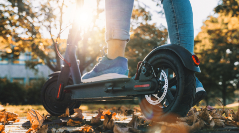 young woman on the electric scooter on the road in autumn at sunset : Stock Photo or Stock Video Download rcfotostock photos, images and assets rcfotostock | RC-Photo-Stock.:
