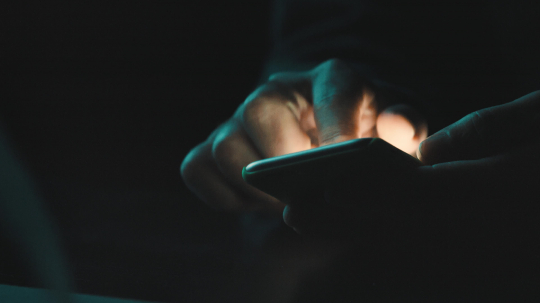 close up of person uses his smartphone at night. low light shot- Stock Photo or Stock Video of rcfotostock | RC-Photo-Stock