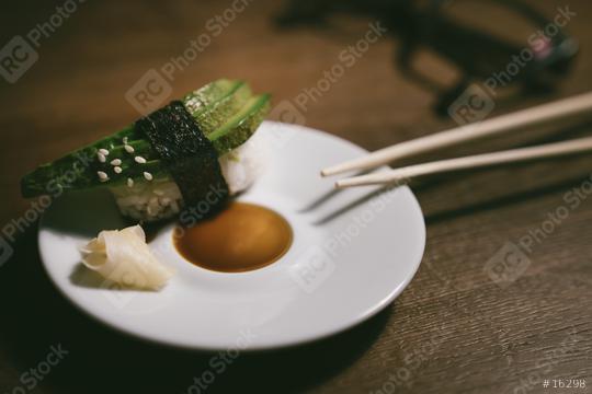 24746726-sashimi-sushi-roll-with-avocado-on-ceramic-plate-with  : Stock Photo or Stock Video Download rcfotostock photos, images and assets rcfotostock | RC Photo Stock.: