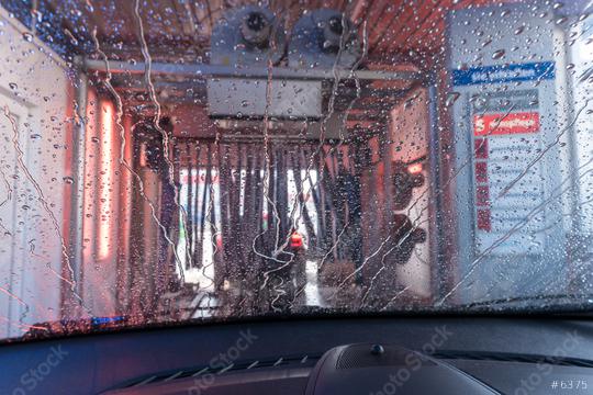 a car Running through automatic car wash  : Stock Photo or Stock Video Download rcfotostock photos, images and assets rcfotostock | RC Photo Stock.: