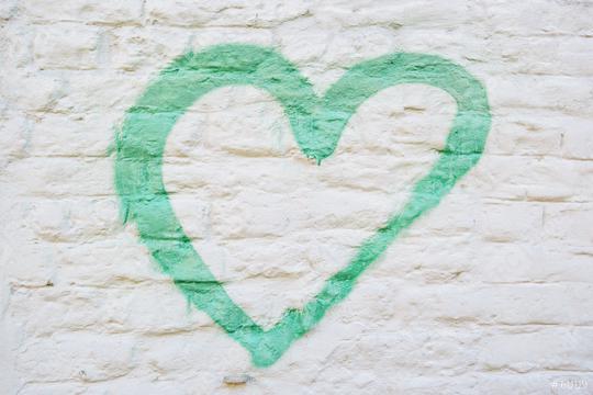 A green heart painted on a distressed white brick wall.  : Stock Photo or Stock Video Download rcfotostock photos, images and assets rcfotostock | RC Photo Stock.: