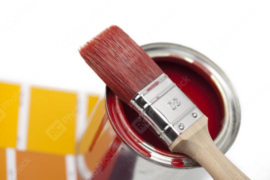 A paintbrush dipped in red paint rests on an open paint can, with color swatches in the background, creating a vivid and artistic scene related to home improvement and painting  : Stock Photo or Stock Video Download rcfotostock photos, images and assets rcfotostock | RC Photo Stock.: