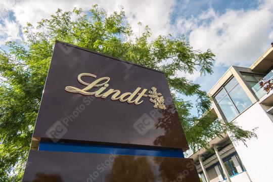 AACHEN, GERMANY APRIL, 2017: Lindt company logo. Lindt is a brand of the Lindt & Sprungli AG - a Swiss company, founded in 1845.  : Stock Photo or Stock Video Download rcfotostock photos, images and assets rcfotostock | RC Photo Stock.: