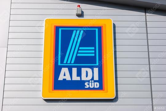 AACHEN, GERMANY FEBRUARY, 2017: Aldi sign (south division) against blue sky. Aldi is a leading global discount supermarket chain with almost 10,000 stores in 18 countries.  : Stock Photo or Stock Video Download rcfotostock photos, images and assets rcfotostock | RC Photo Stock.: