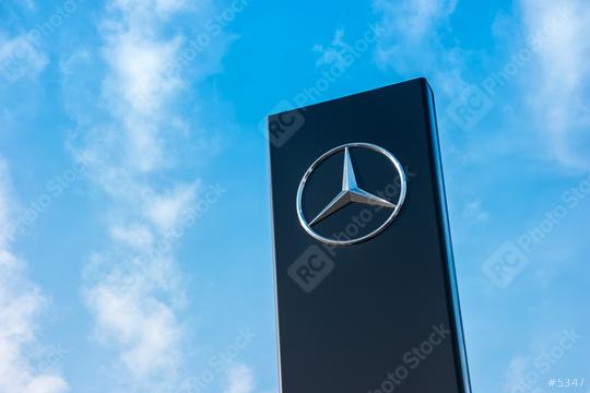 AACHEN, GERMANY FEBRUARY, 2017: Mercedes Benz Logo with cloudy sky. Founded in 1926 is a German luxury automobile manufacturer, a multinational division of the German manufacturer Daimler AG.  : Stock Photo or Stock Video Download rcfotostock photos, images and assets rcfotostock | RC Photo Stock.: