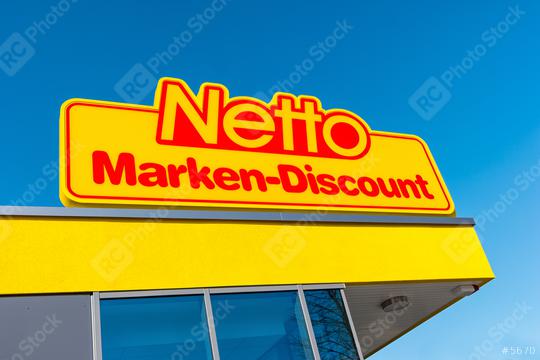 AACHEN, GERMANY FEBRUARY, 2017: Netto discount store against blue sky. It is part of Edeka Group, largest German supermarket corporation employing 250,000 people.  : Stock Photo or Stock Video Download rcfotostock photos, images and assets rcfotostock | RC Photo Stock.: