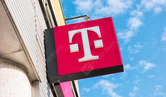 AACHEN, GERMANY FEBRUARY, 2017: New Logo of Deutsche Telekom on a shop. There are around 750 so called "T-Punkt" shops which sell products and services of Deutsche Telekom.  : Stock Photo or Stock Video Download rcfotostock photos, images and assets rcfotostock | RC Photo Stock.: