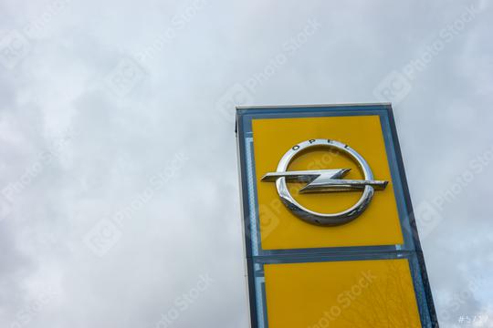 AACHEN, GERMANY FEBRUARY, 2017: Opel official dealership logo over cloudy Sky. Opel AG is a German automobile manufacturer and a subsidiary of the American General Motors Company.  : Stock Photo or Stock Video Download rcfotostock photos, images and assets rcfotostock | RC Photo Stock.: