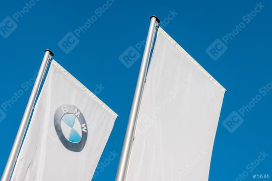 AACHEN, GERMANY FEBRUARY, 2017: Sign of a BMW logo on white flags. BMW is a vehicle, motorcycle, and engine manufacturing company from Munich, Bavaria, Germany.  : Stock Photo or Stock Video Download rcfotostock photos, images and assets rcfotostock | RC Photo Stock.:
