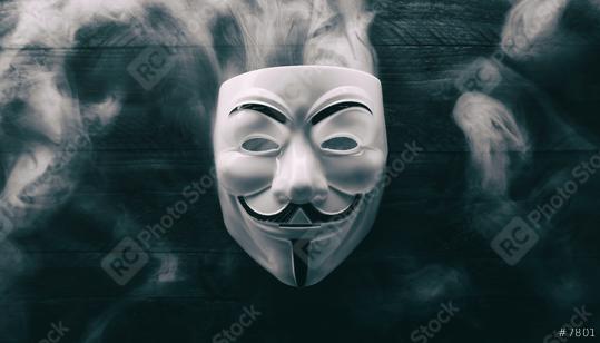 AACHEN, GERMANY FEBRUARY, 2017: Studio shot of a AnonymousVendetta mask on wooden backgroud  : Stock Photo or Stock Video Download rcfotostock photos, images and assets rcfotostock | RC Photo Stock.: