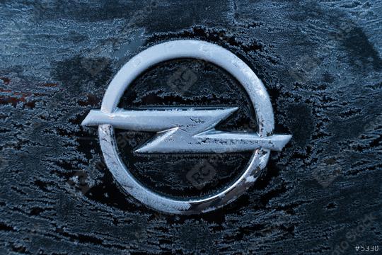 AACHEN, GERMANY JANUARY, 2017: Frozen Opel logo on a car. Opel AG is a German automobile manufacturer.  : Stock Photo or Stock Video Download rcfotostock photos, images and assets rcfotostock | RC Photo Stock.: