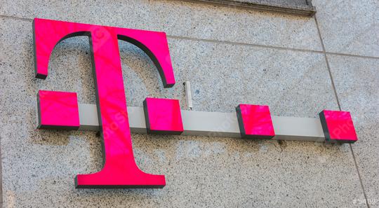 AACHEN, GERMANY JANUARY, 2017: Logo of Deutsche Telekom on a shop. There are around 750 so called "T-Punkt" shops which sell products and services of Deutsche Telekom.  : Stock Photo or Stock Video Download rcfotostock photos, images and assets rcfotostock | RC Photo Stock.: